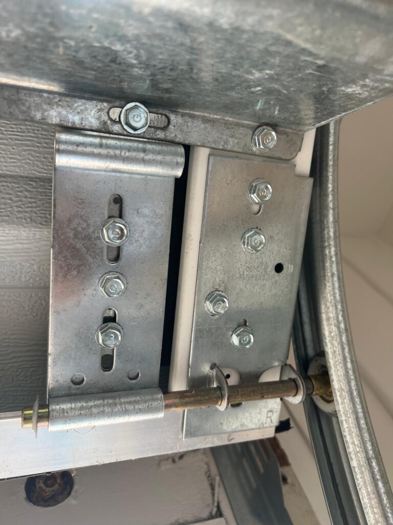 Garage door cable, roller and track repair in Santa Clara