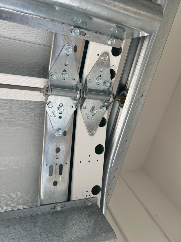 Garage door cable, roller and track repair in Santa Clara